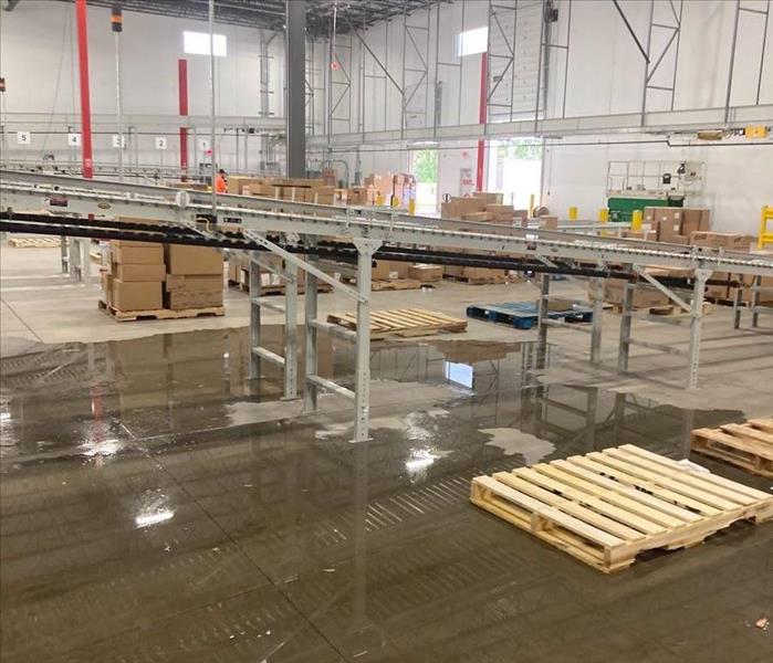 water on warehouse floor